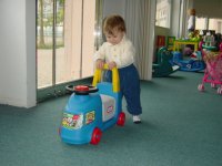 Playing at Dramarama - see I can walk by myself with a little help from a stroller