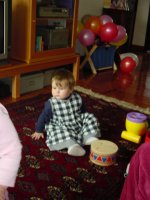 Georgia's First birthday party - Lottie in new her party frock