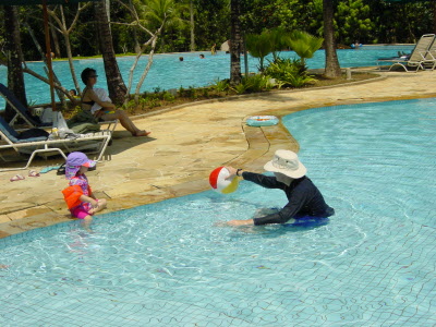 Daddy playing ball with Lottie.