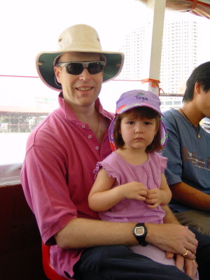Heading up river on a river taxi to the Grand Palace in Bangkok