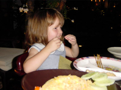 Tucking into satay! 