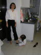 A little ritual evening - Lottie taking off Mummy's shoes.