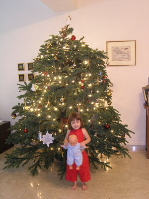 Lottie and her Christmas tree.