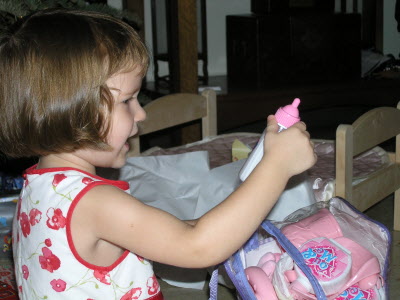 Lottie and the new milk bottle.