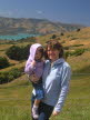 Susan and Lottie with French settlement of Akaroa in background.