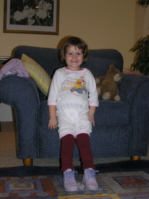 Lottie putting on her flight socks - just like Grandma Norma!