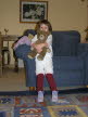 Lottie putting on her flight socks - just like Grandma Norma!