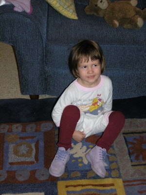 Lottie putting on her flight socks - just like Grandma Norma!