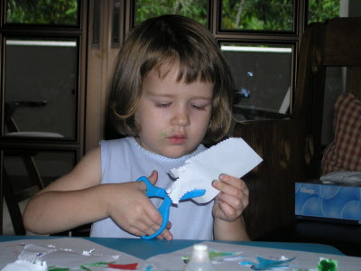 A home art class... plus learning to use scissors.