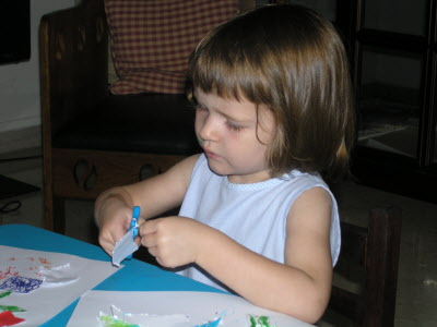 A home art class... plus learning to use scissors.