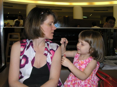 Lip glossing.