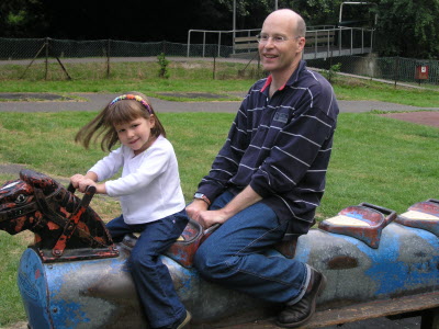 Lottie and Daddy in the playground.