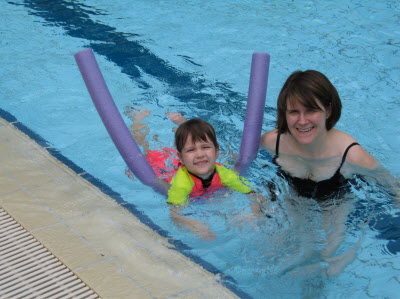 Susan and Lottie swimming at the American Club.