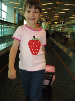 World traveller with her roller bag!