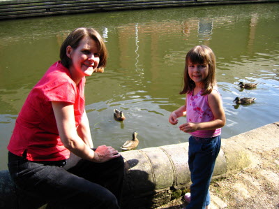 Susan and Lottie - feeding ducks on the canal.