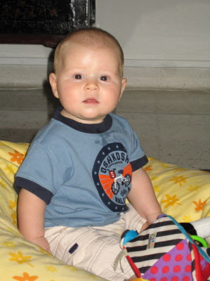 Burtie Boy sitting up.