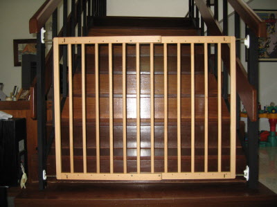 Bottom stair gate brackets painted black.
