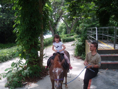 Lottie riding.