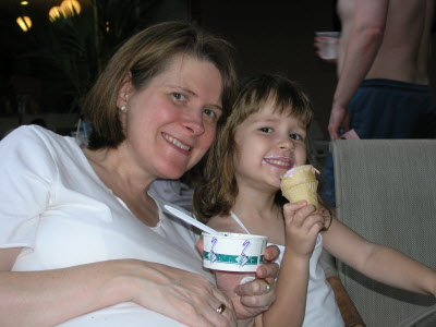Girls eating ice cream together.