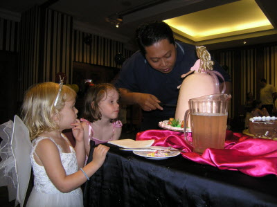 Cutting the cake with the chef.