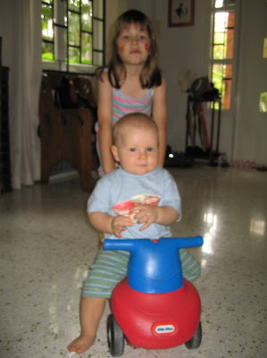 Lottie teacing Conrad to drive.