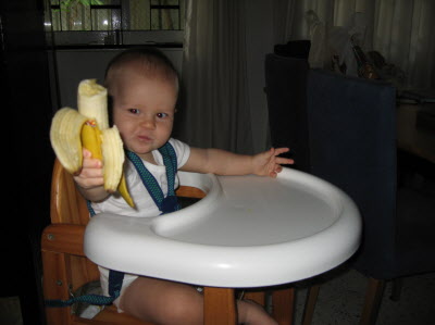 This boy likes banana's...