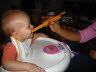 Lottie was using chop sticks - so Conrad wanted to use them too.