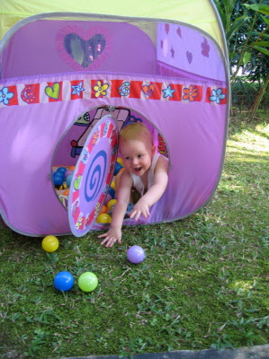Lottie and Conrad playing in the garden.