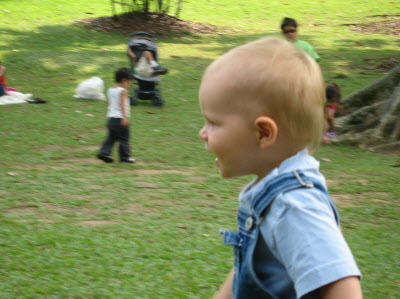 Lottie and Conrad playing ball in the Botanical gardens.