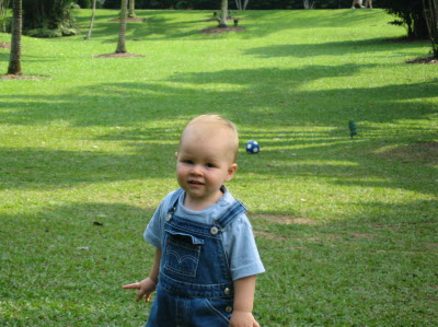 Lottie and Conrad playing ball in the Botanical gardens.