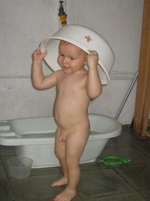 Conrad playing outside with water...