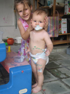 How did this boy get so much paint around his mouth?
