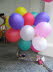 Playing hide and seek with the balloons.
