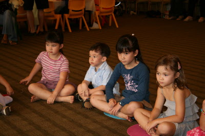 Ciara, Michael, Siobhan and Kiara playing pass the parcel