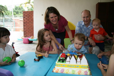 Conrad blowing out his candles.