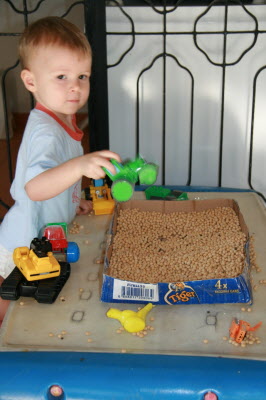 Conrad and his chick pea "sand box".