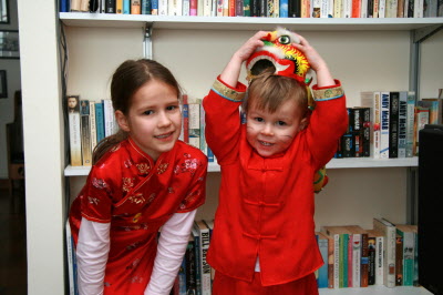 Lottie & Conrad in Chinese outfilts.