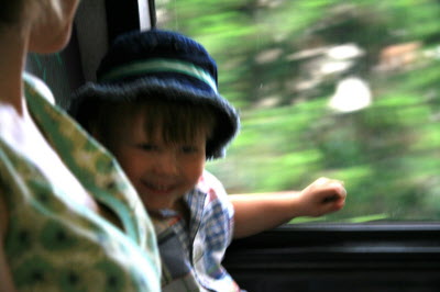 Conrad having fun on the bus with his Mummy.