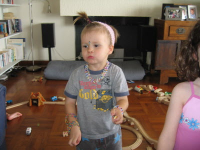 Conrad being dressed up by his sister...
