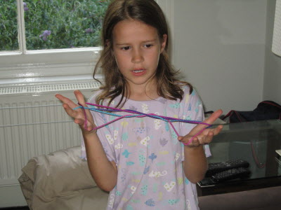 Teaching Grandma Norma cat's cradle.