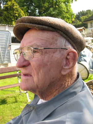 Dad sitting in the garden.