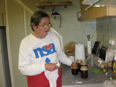 Mum making strawberry jam.