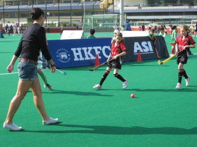 Lottie playing for Valley under 8s Hockey Team.