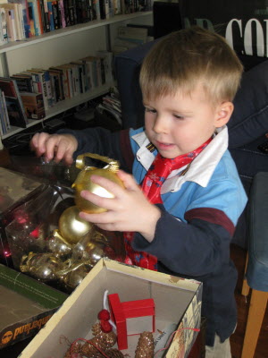 Conrad choosing decorations.