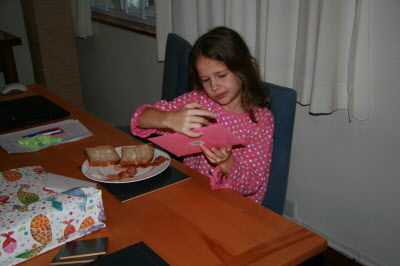 Opening presents at breakfast (with bacon sandwiches!)