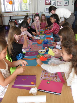 The guests get busy decorating note books