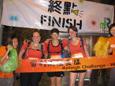 Three very happy Middleton Marchers all crossing the 30km finish line.
