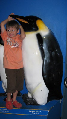 Conrad and a Emperor Penguin.