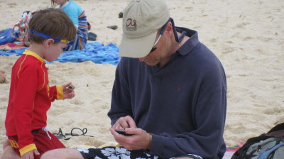 Daddy working out the mortgage repayments!
