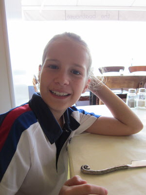 Lottie after winning all 3 of her tennis matches.